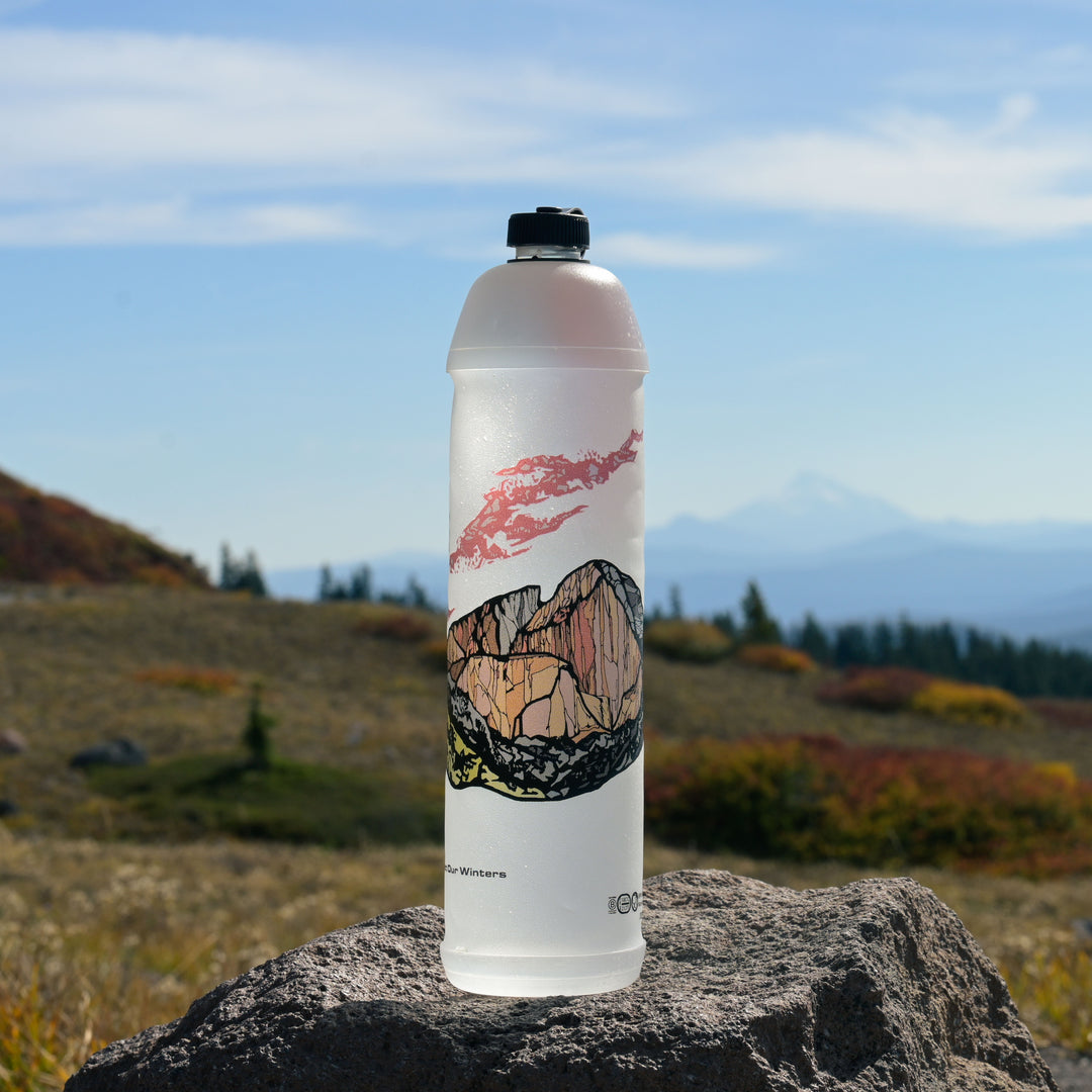 The back of 'Longs Peak Alpenglow' Vesica showing off artwork of Longs Peak